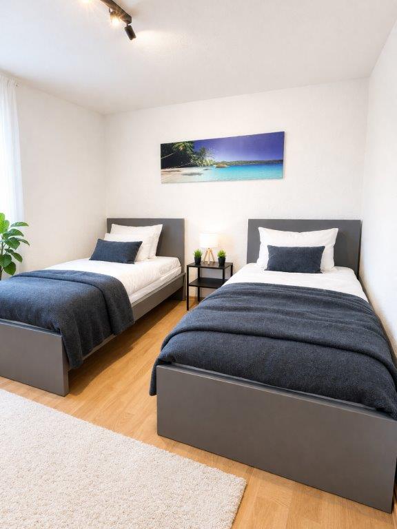 Zwei Betten in Apartment 17