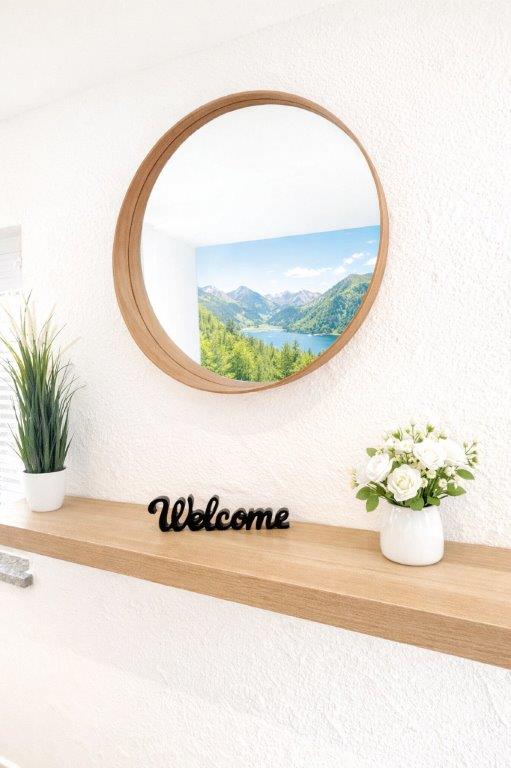 Willkommensgruß mit Bergblick und Blumen in Apartment 17