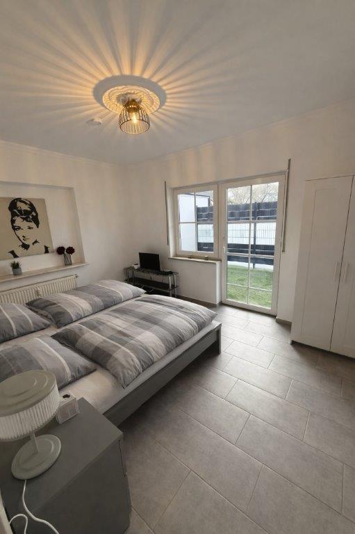 Hauptschlafzimmer in Apartment 61