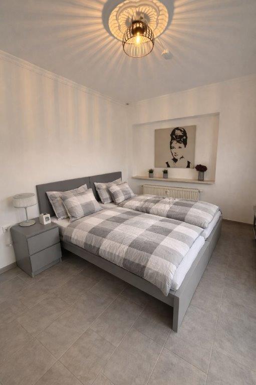 Schlafzimmer in Apartment 61